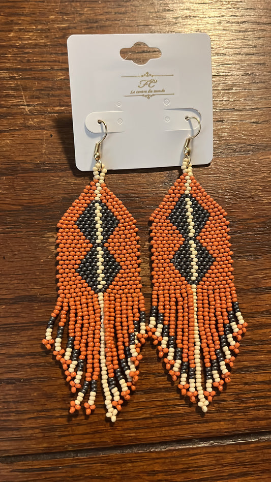 Rust n Tassel Shoulder Dusters