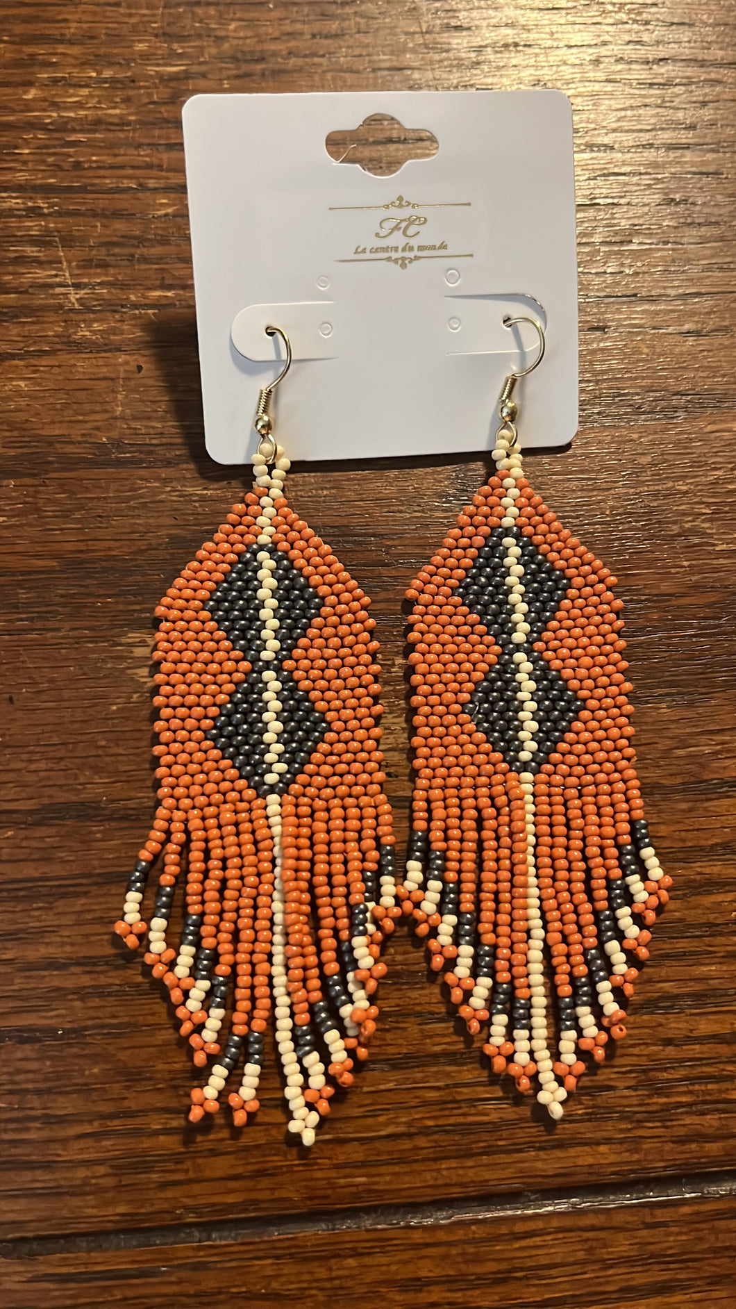 Rust n Tassel Shoulder Dusters